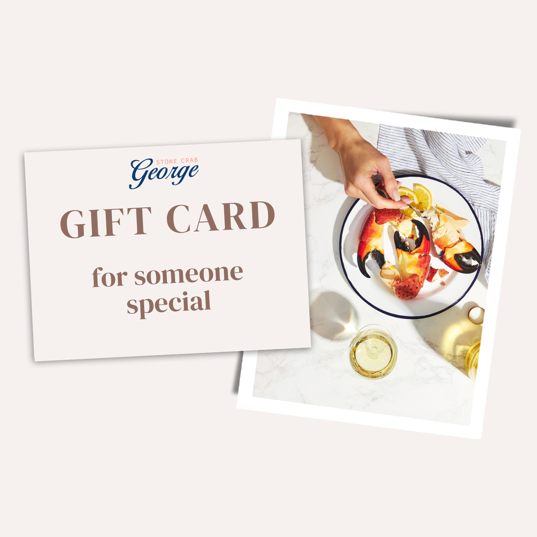 A gift card set from George's Car & Wine Club featuring a large cream card that reads 'GIFT CARD for someone special' and a smaller photo card showing a lobster on a plate with a hand reaching in, on a light beige background.
